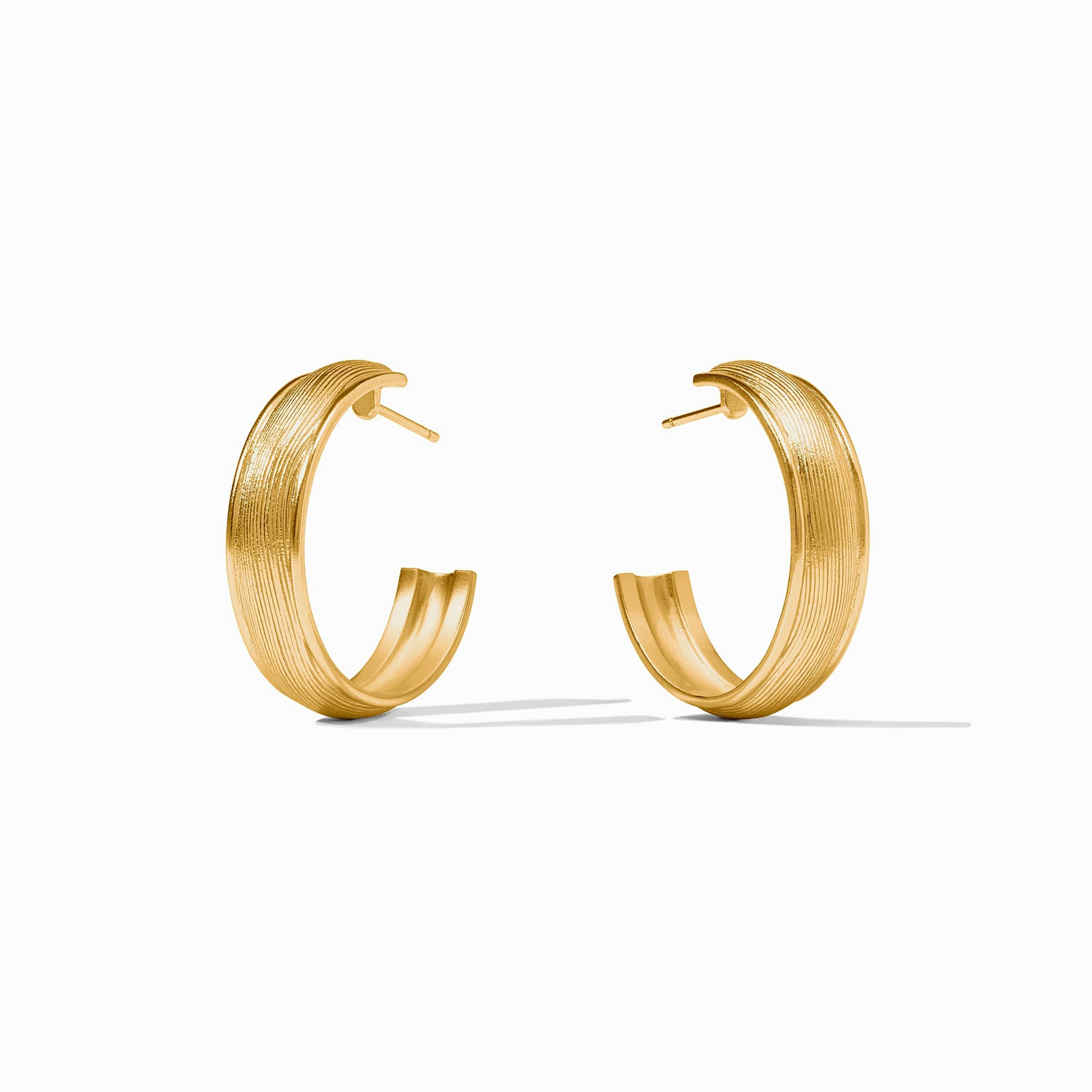 Gold Cobblestone Hoop earrings with a textured, grooved finish and post backs.