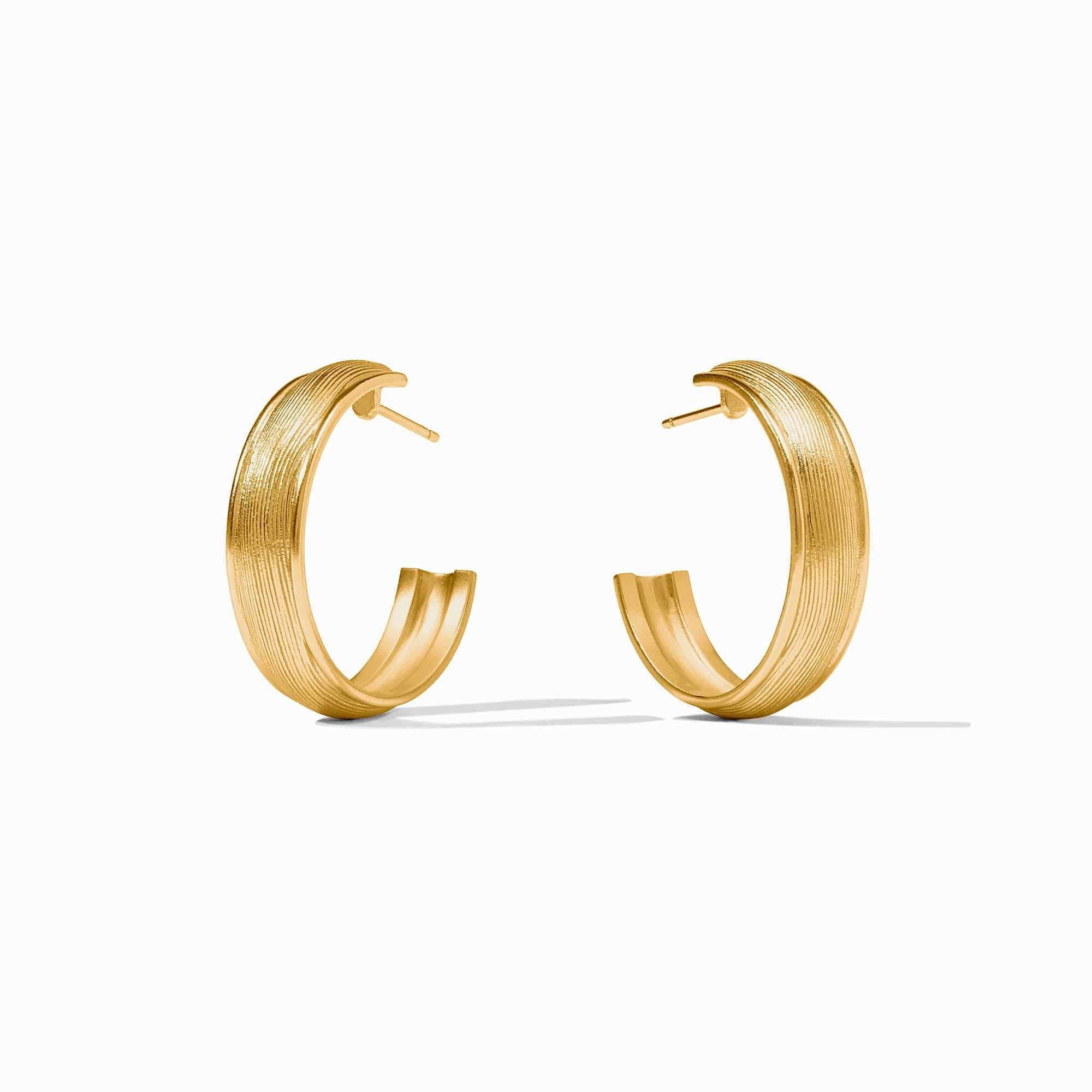Gold Cobblestone Hoop earrings with a textured, grooved finish and post backs.