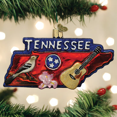 State Of Tennessee ornament featuring a blue state outline with white stars on a red background.