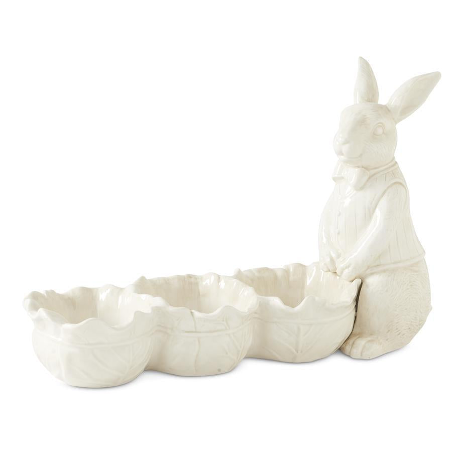 Set of two antiqued white dolomite divided cabbage bowls with a rabbit figurine.