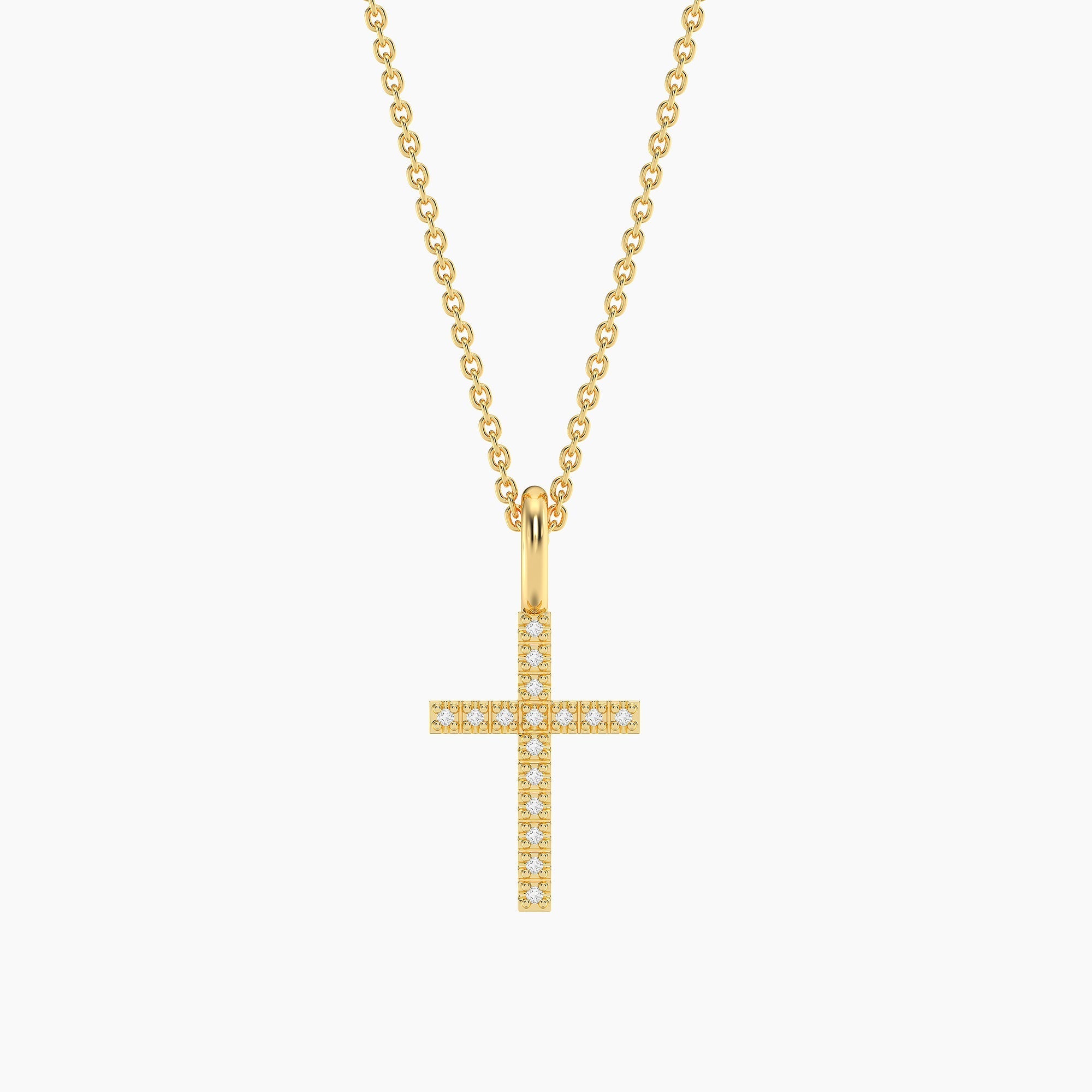 Gold plated stainless steel cross pendant necklace on a silver chain with lobster clasp.