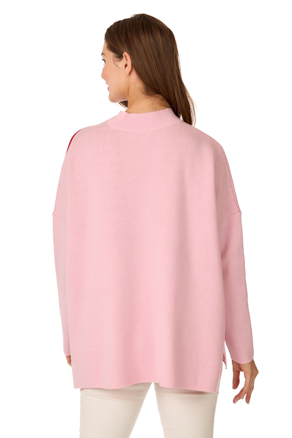 Back view of a woman wearing a light pink oversized Valentine's Jacquard Sweater.