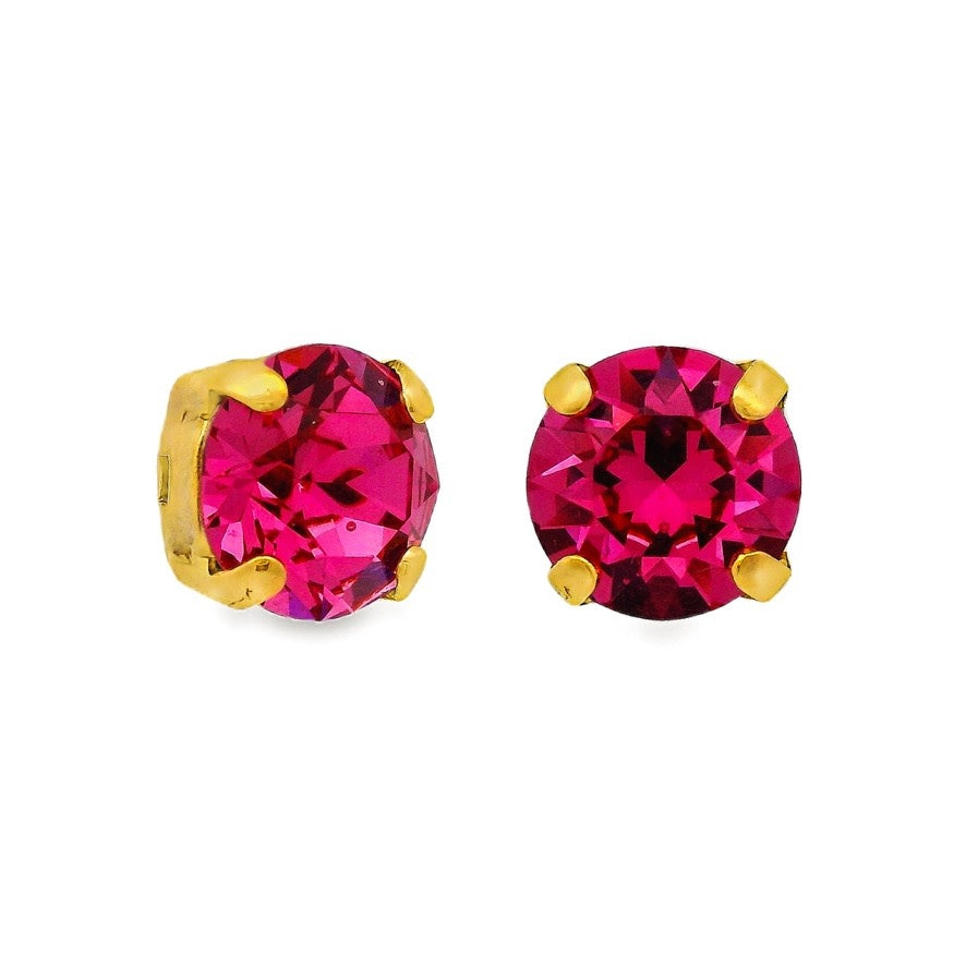 Rose gold antique brass stud earring with an eight-millimeter clear crystal in a bohemian silhouette.