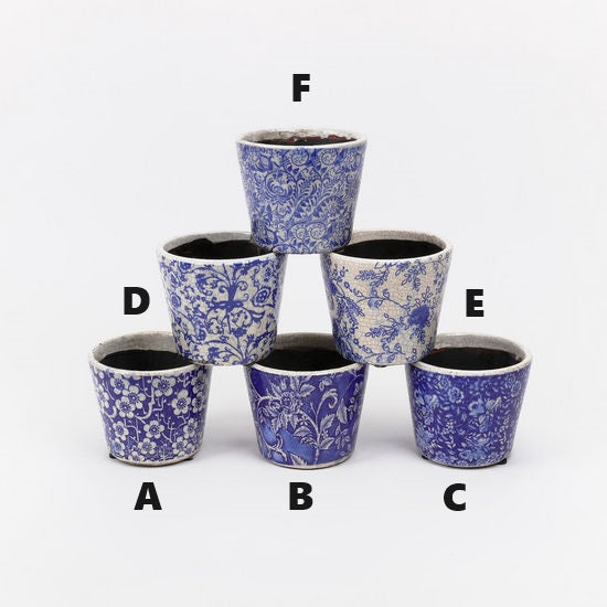 4.75-inch round pot with blue exterior glaze and white interior.