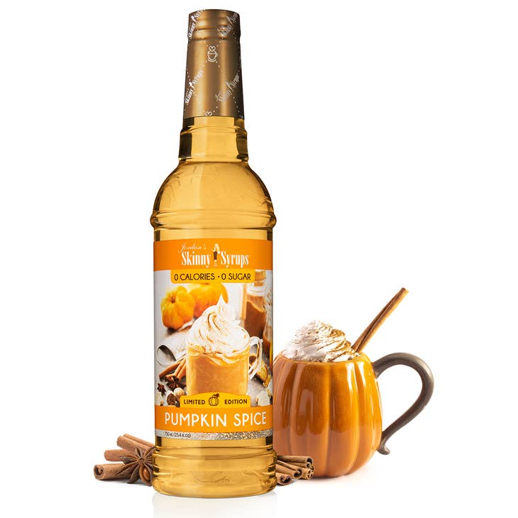 Bottle of sugar-free vanilla almond flavored drink with a clear label.