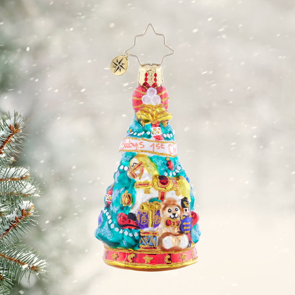 Tot's First Tree Gem glass Christmas ornament with toys and 'Baby's 1st Christmas' banner.