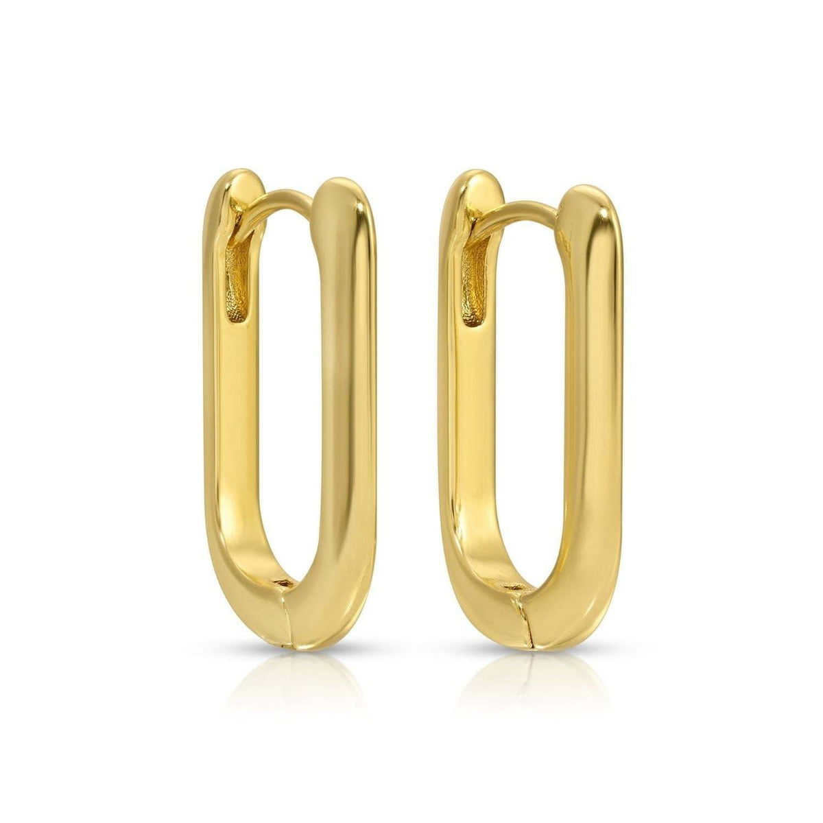 Oblong huggie hoop earrings with a .74-inch drop in rhodium-plated brass.