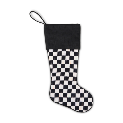 Black and white checkered Christmas stocking with a solid black cuff and hanging loop.