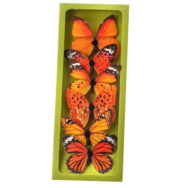 4.25-inch fabric butterfly applique in white with a delicate wing pattern.