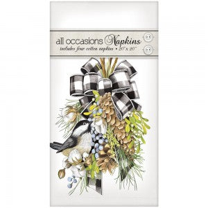 Four white cotton napkins with decorative graphics in a sealed cello bag.