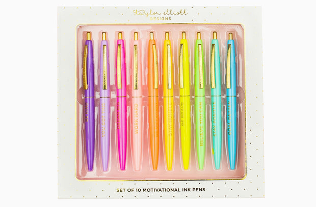 White gift box containing ten black medium ballpoint pens with gold foil motivational sayings.