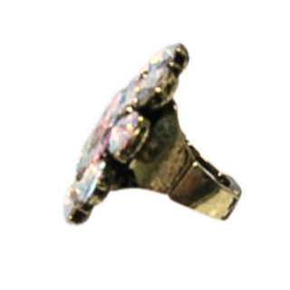 Stretchable antique gold ring with large pink stone surrounded by iridescent rhinestones in a floral pattern.