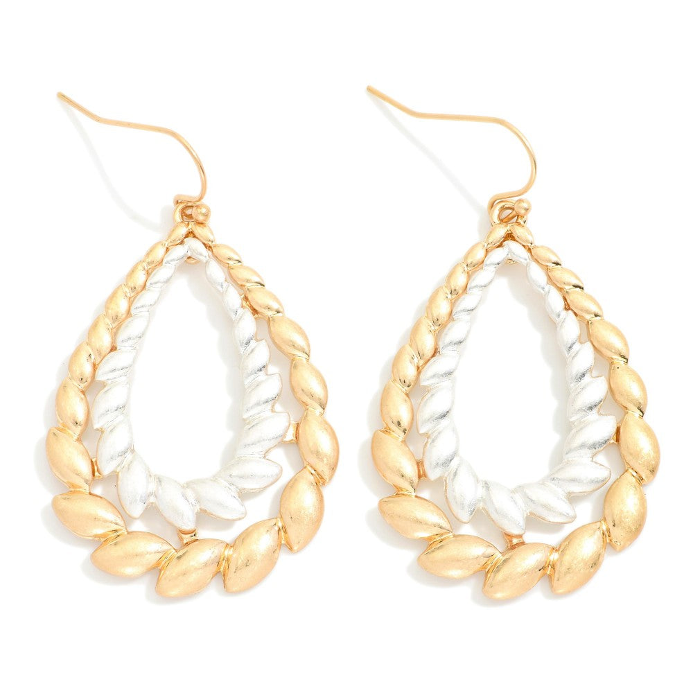 Layered metal seed teardrop drop earrings with multiple textured tiers