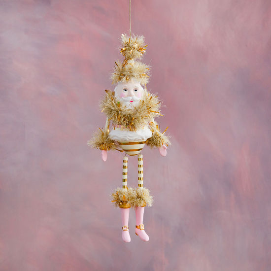 Resin Papa Noel figure with white beard and red suit standing on a base.