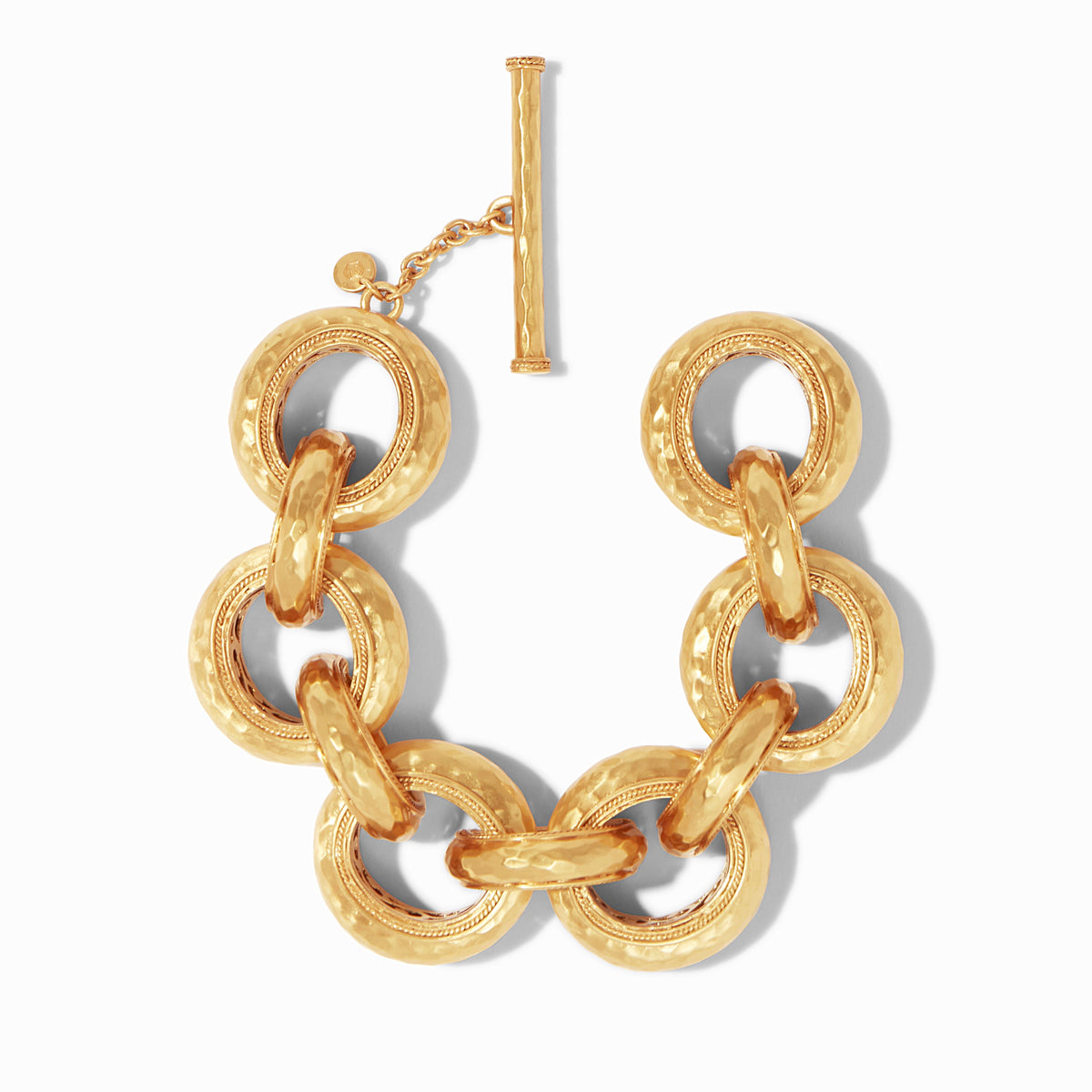 Cannes Link Bracelet in hammered gold with a toggle clasp
