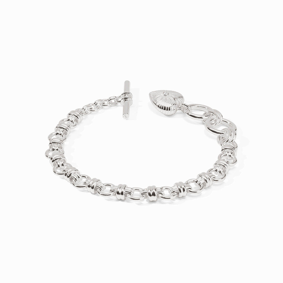 Silver chunky chain bracelet with a puffed heart charm and toggle closure.