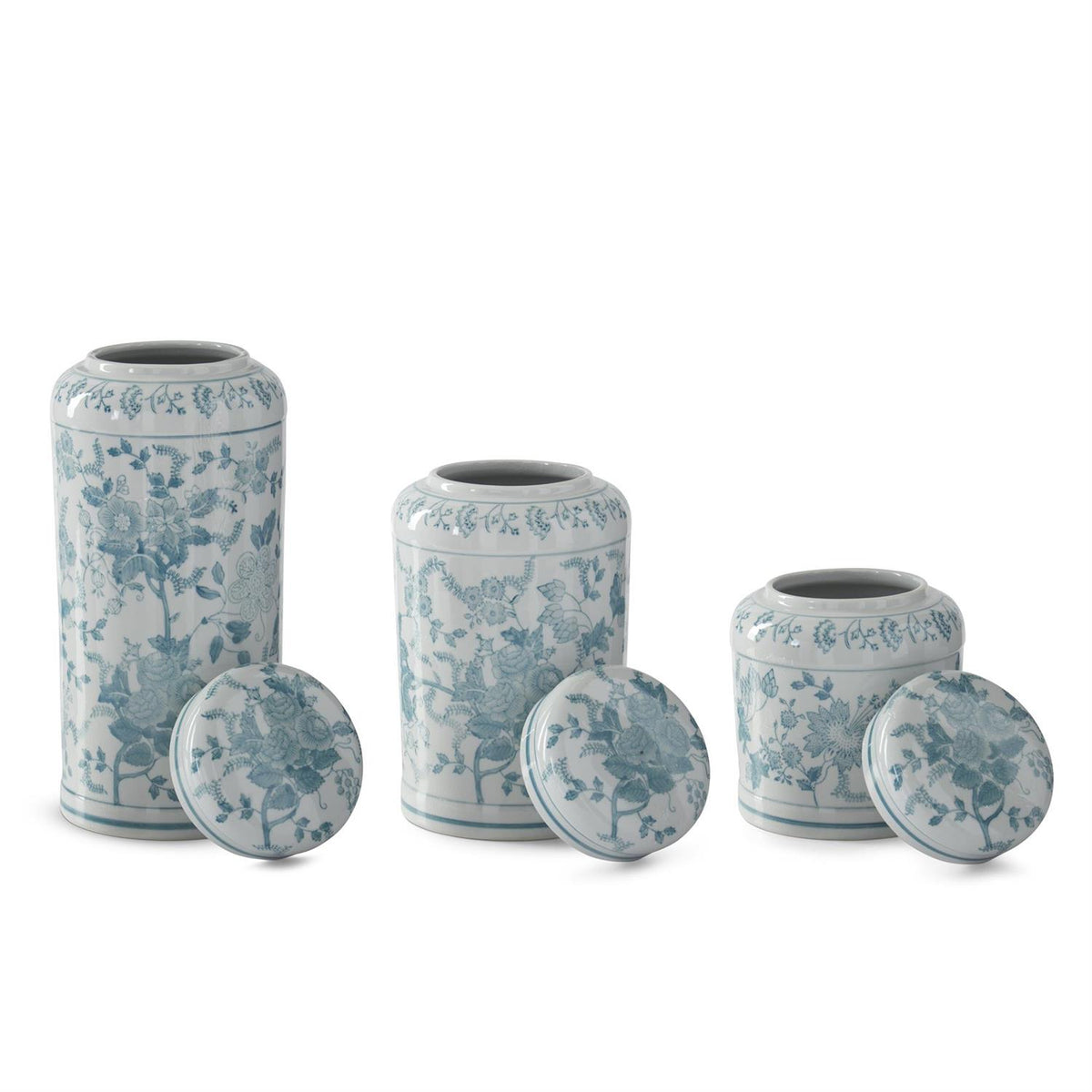Teal porcelain lidded jar with white chinoiserie floral pattern on a cylindrical silhouette.