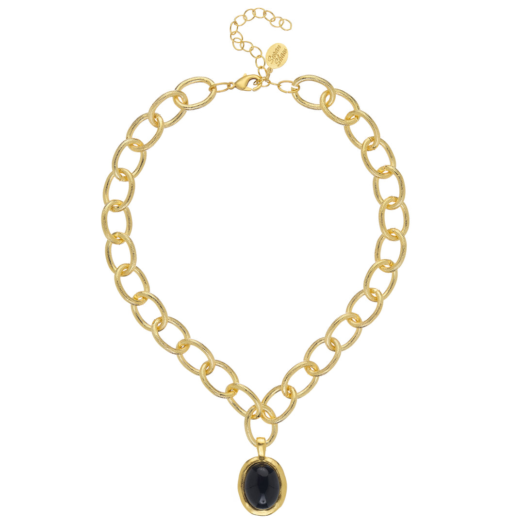 Caroline gold chain necklace with a black onyx oval pendant and lobster claw clasp.