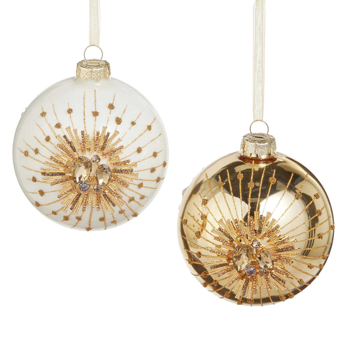 White and gold glass ball ornaments with sparkling jewel starburst designs and hanging ribbons.