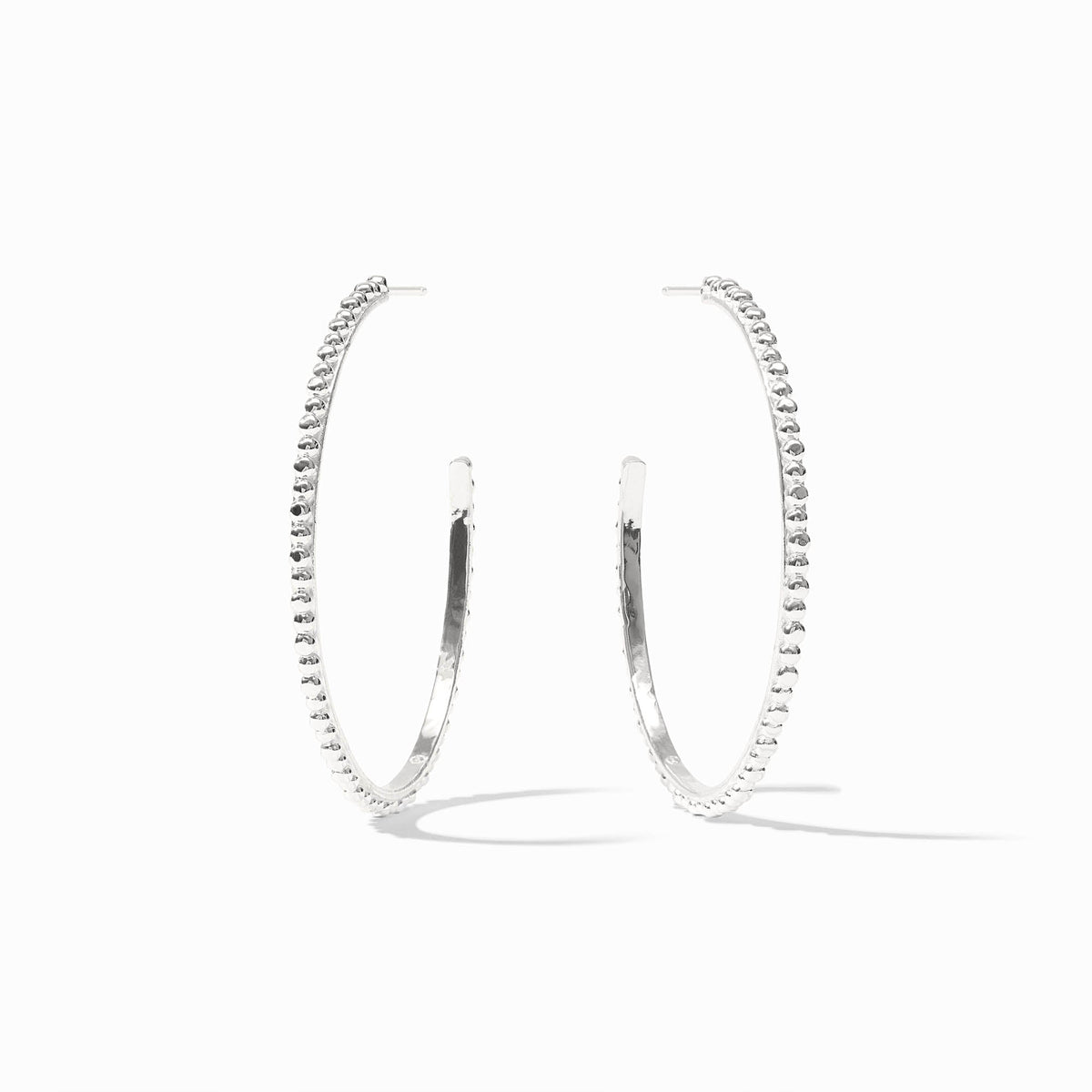 A pair of large silver Colette bead hoop earrings with a textured beaded design and post backs.