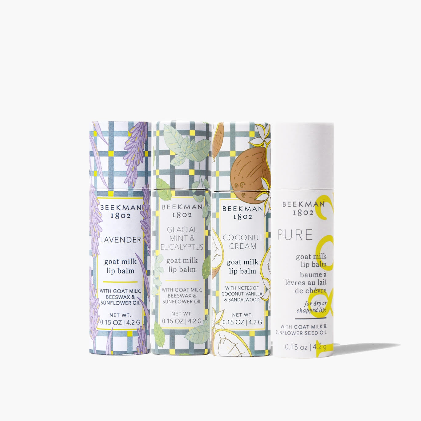 Gift set containing four lip balms in Glacial Mint, Lavender, PURE, and Coconut Cream flavors.