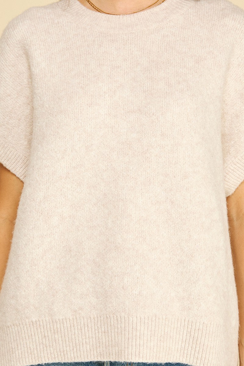 Bailey solid knit sweater in cap sleeve silhouette with a relaxed fit.