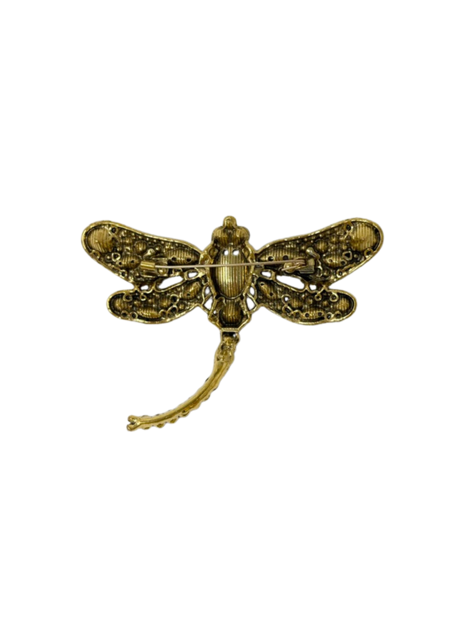 Back view of a gold-toned dragonfly brooch with a pin clasp mechanism and textured metal finish.