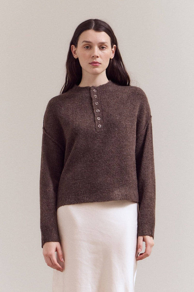 Natasha half button down sweater in dark gray with a relaxed fit.