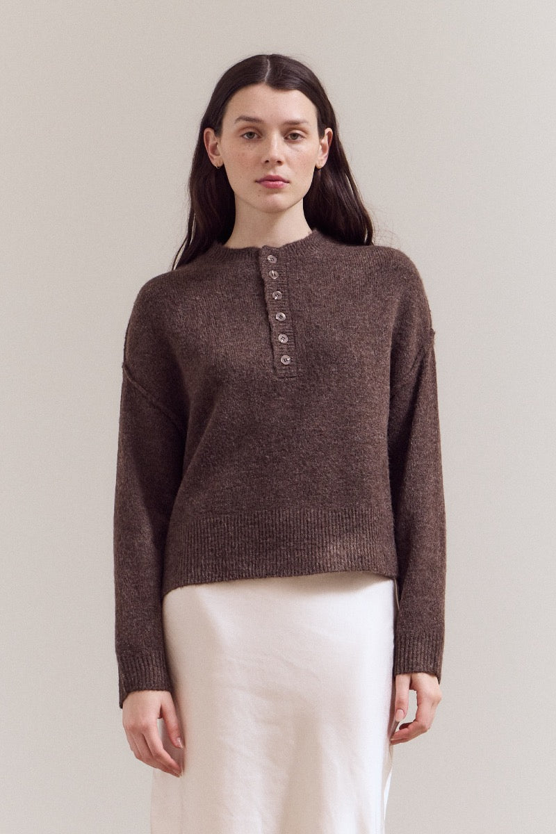 Natasha half button down sweater in dark gray with a relaxed fit.