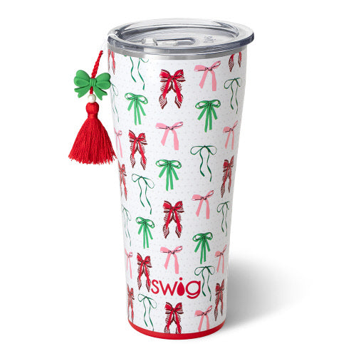 32oz stainless steel tumbler with a white background and a festive red, green, and pink bow pattern.