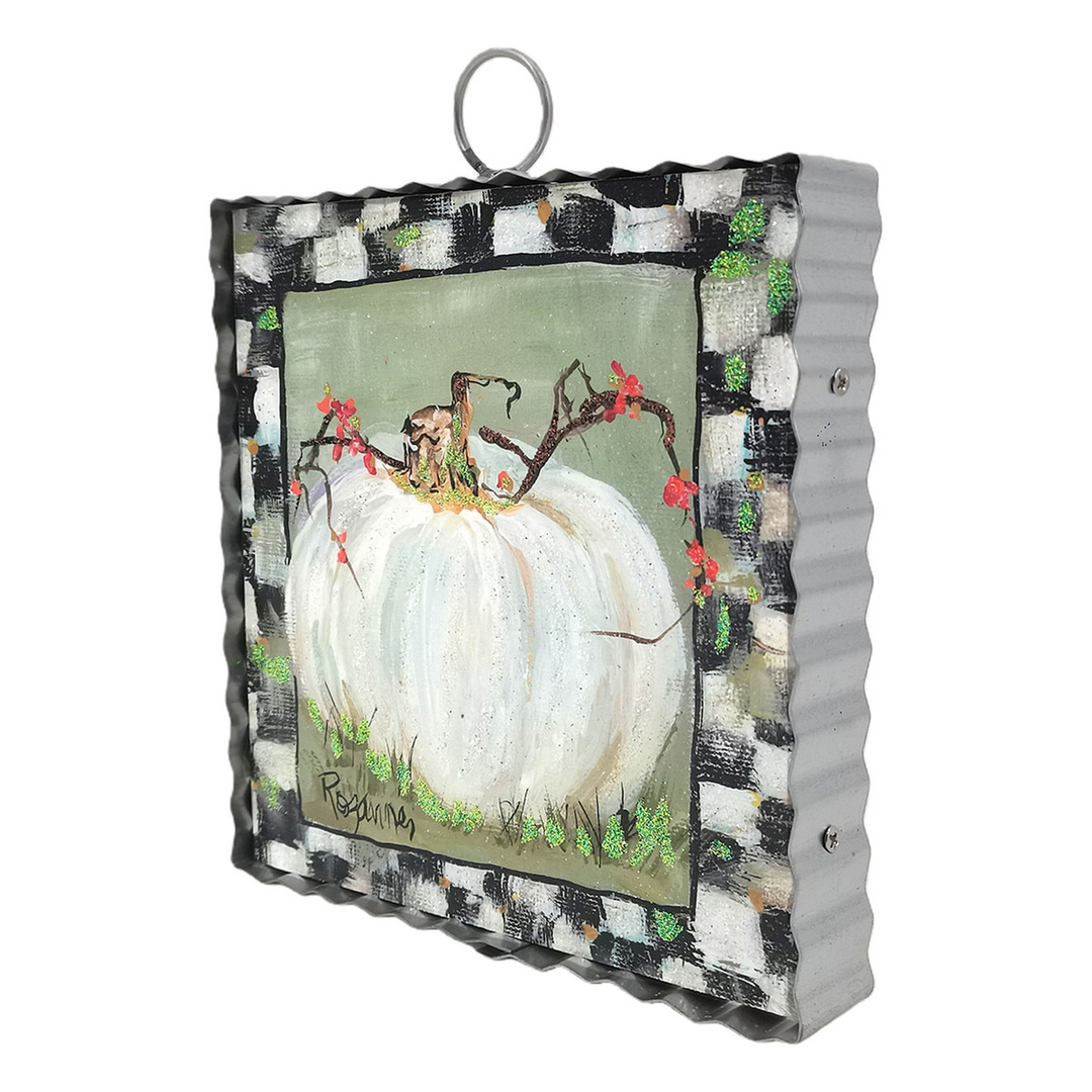 Mini art piece featuring a cream pumpkin with a black and white checkered border on metal frame.