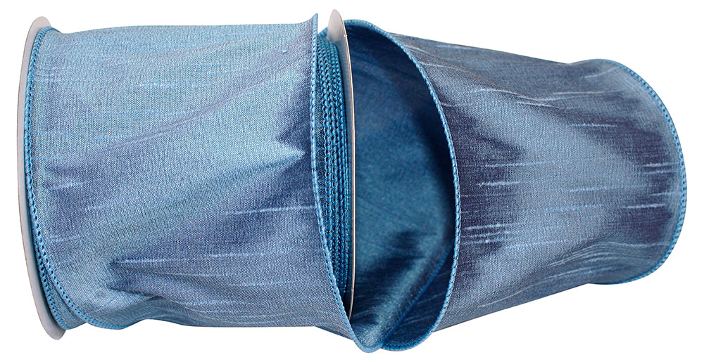 4 inch French Blue Dupioni Supreme wired edge ribbon on a spool.