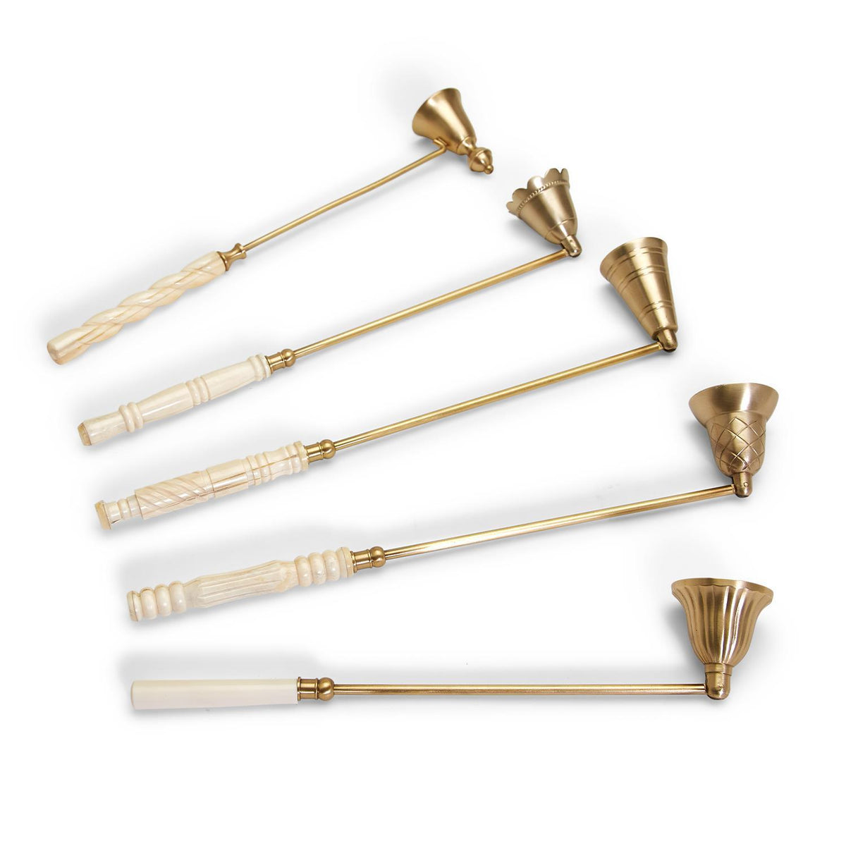 Five antiqued gold candle snuffers with various carved white handles and bell-shaped heads.