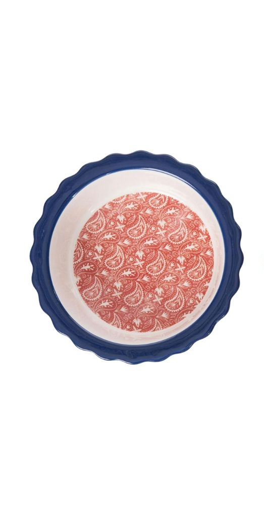 Mini Dolomite Americana Pie Dish with a blue scalloped rim and red paisley interior pattern.