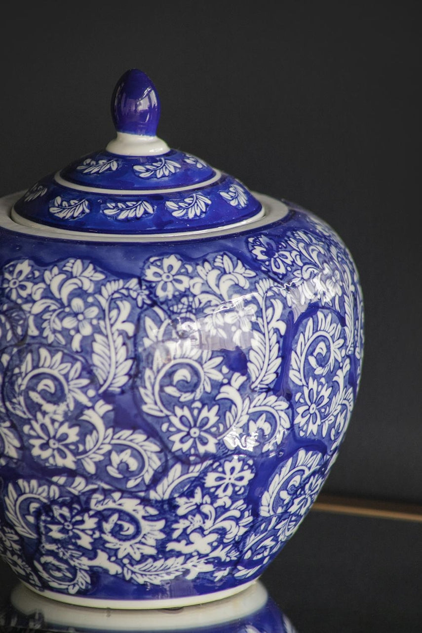 Round porcelain ginger jar in blue and white with a matching lid