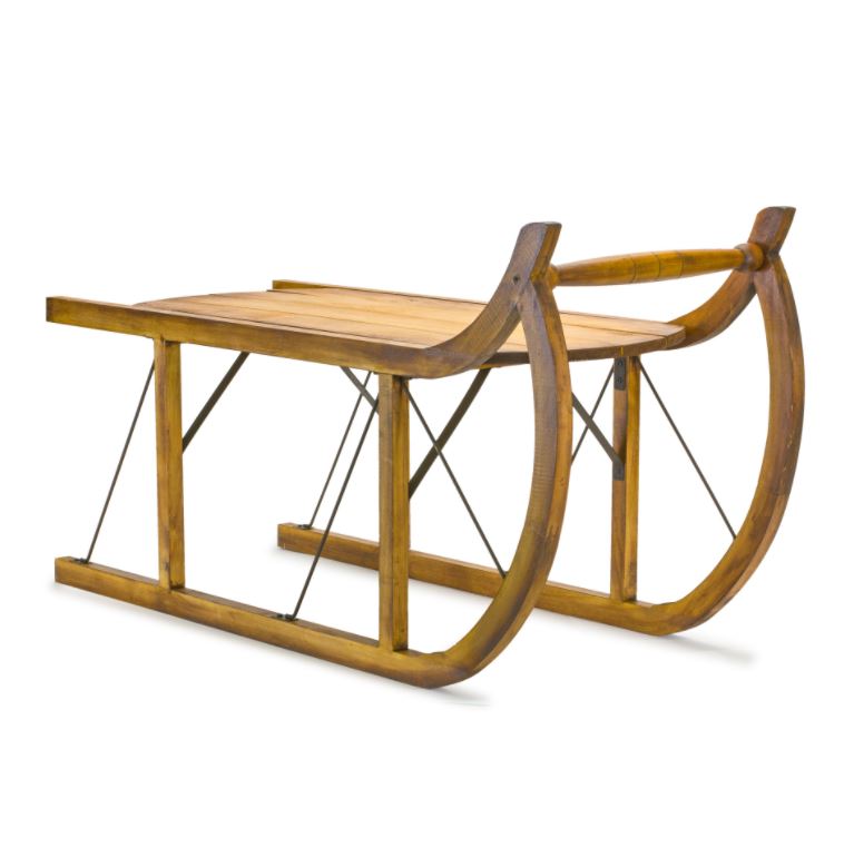 Vintage-style wooden sled with curved runners, a slatted seat, and metal support rods.