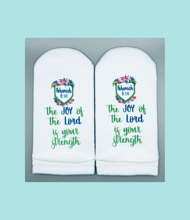 White no-show socks featuring Nehemiah 8:10 and 'the JOY of the Lord is your strength' in script.