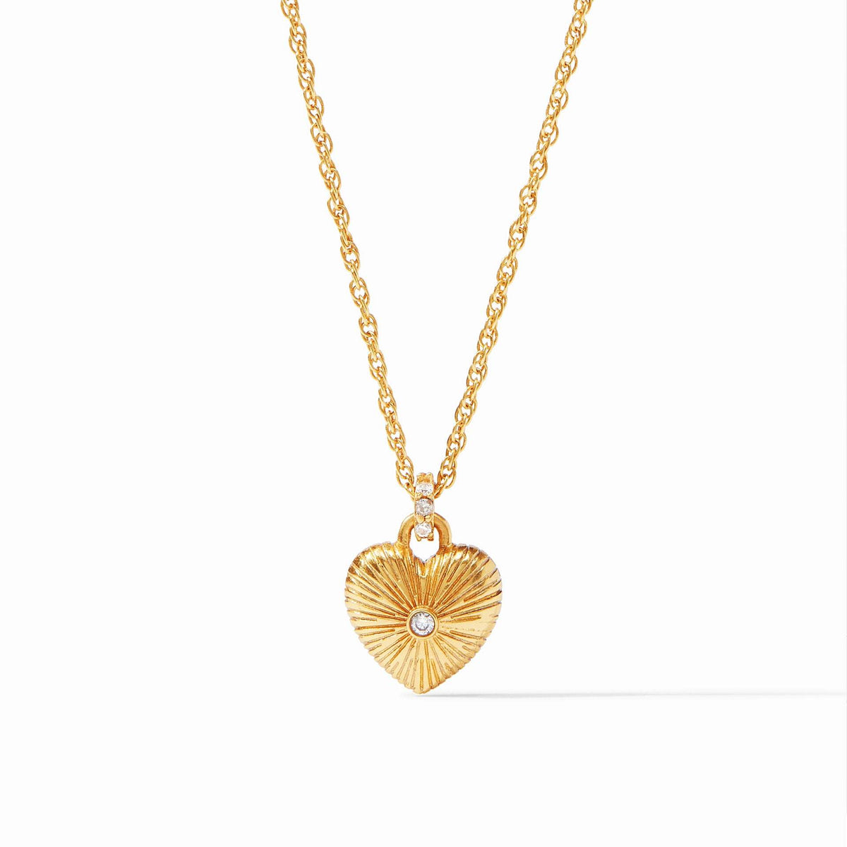 Esme puffy golden heart solitaire necklace with cubic zirconia on a gold chain.