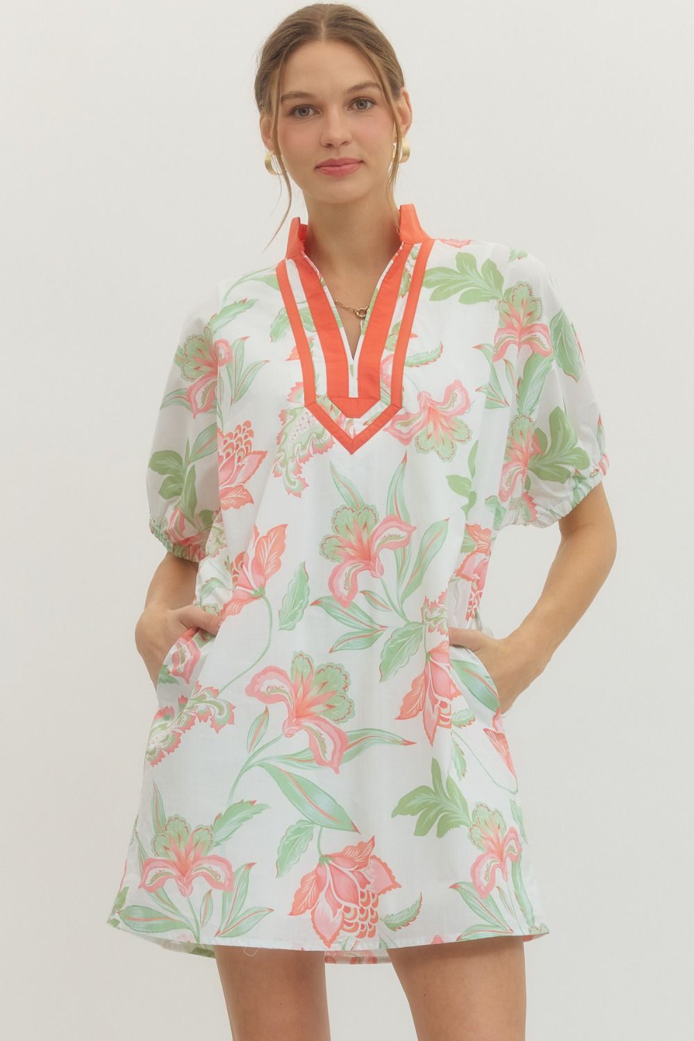 Ella floral print mini dress with puff sleeves, contrast band collar V-neck, side pockets in lightweight cotton.