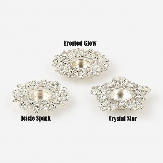 Three 5-inch jeweled snowflake tea light holders in Frosted Glow, Icicle Spark, and Crystal Star.