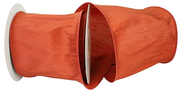4-inch wide orange Dupioni wired edge ribbon on a spool.