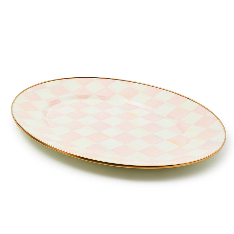 Rosy Check Medium Oval Platter with hand-painted pink and white checks and a bronzed steel rim.