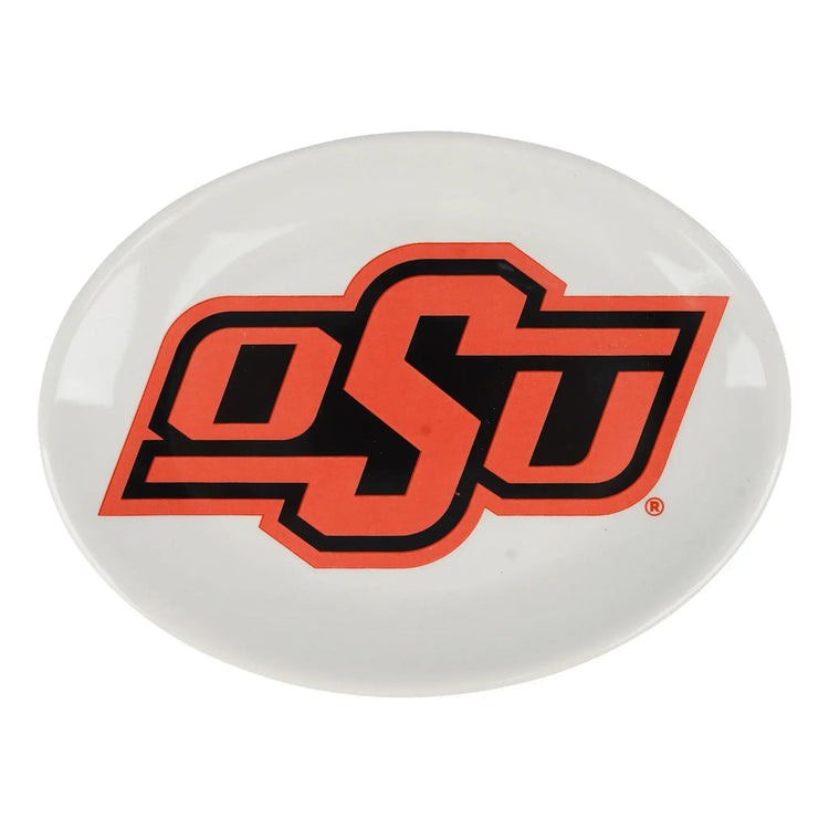 Oklahoma State Cowboys trinket tray with team logo on a dark brown wooden surface.
