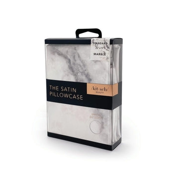 Satin pillowcase in a soft neutral tone with smooth texture.