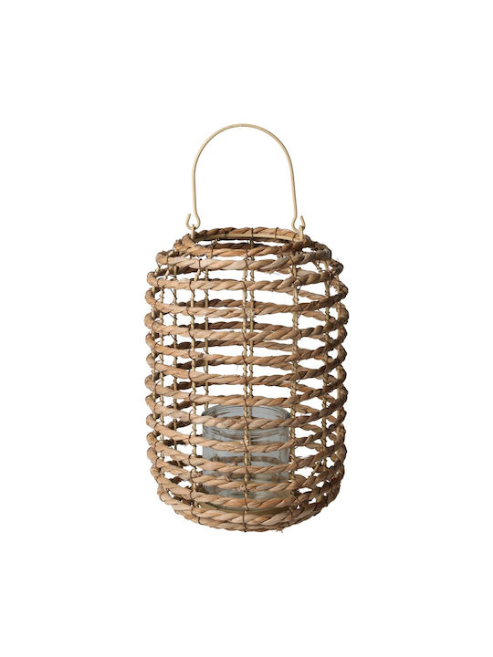 Hand-woven natural cattail leaf lantern with a metal frame handle and glass cylinder interior.