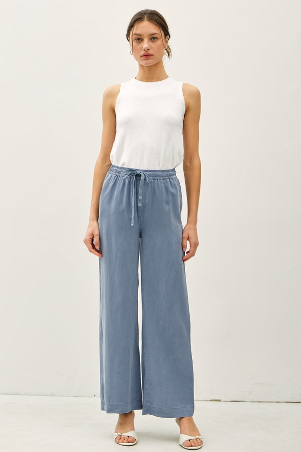 Women's Jane Tencel wide leg pant in neutral tone with elastic waistband and side pockets.