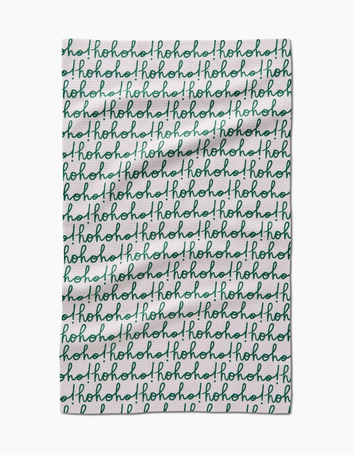 Holiday tea towel with waffle weave construction in red featuring a festive snowman pattern.