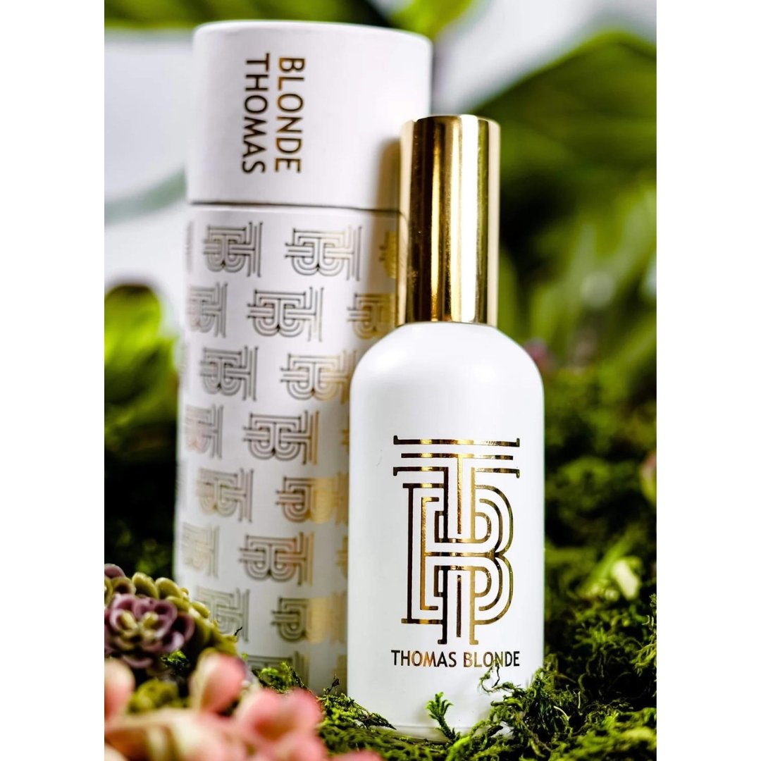 Bottle of Room Re-Fresh Linen Spray with a pump dispenser.