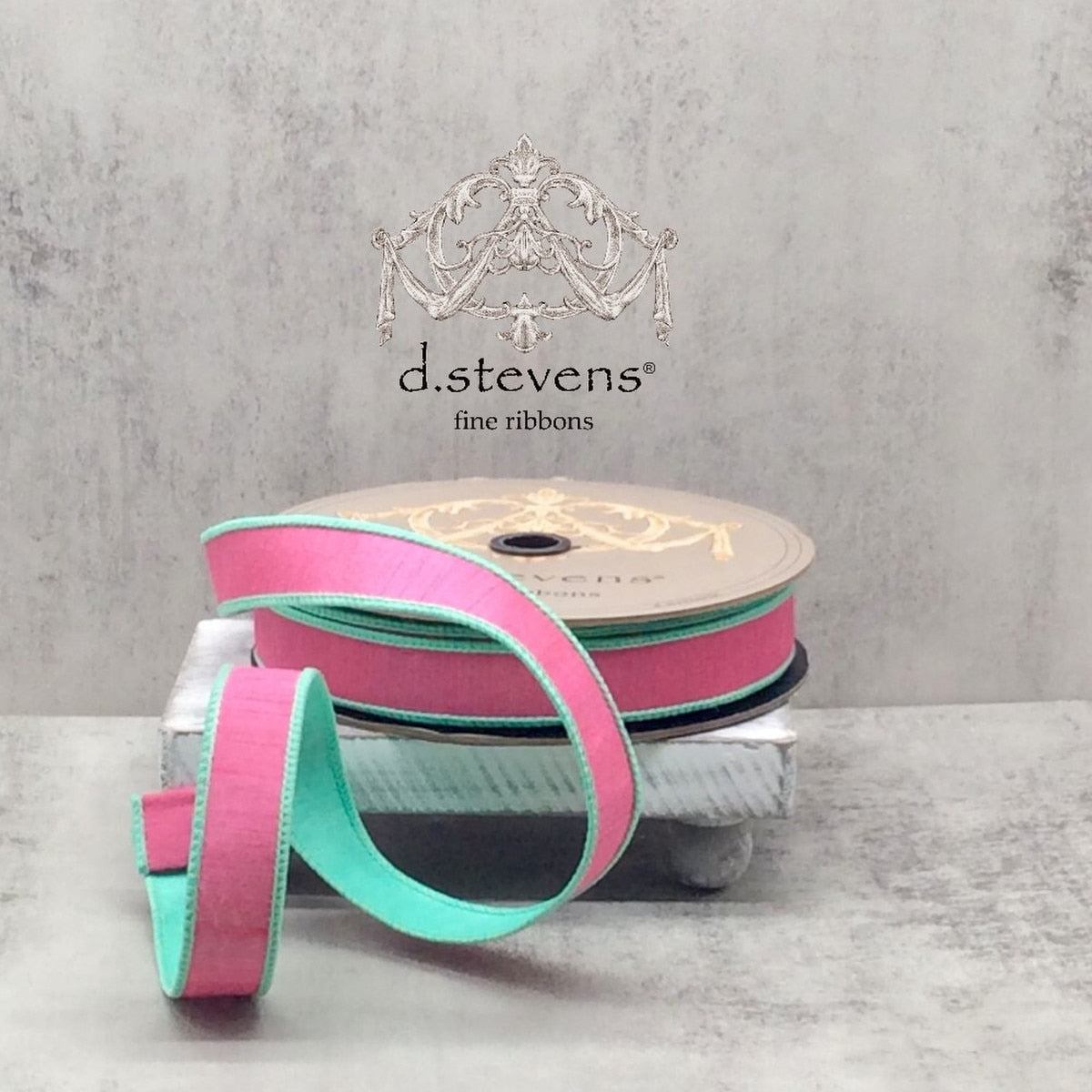 One-inch wide double-sided dupion ribbon in a solid color with a subtle sheen.