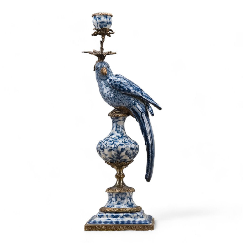 Blue and white porcelain parrot candle holder with bronze ormolu accents on a square base.